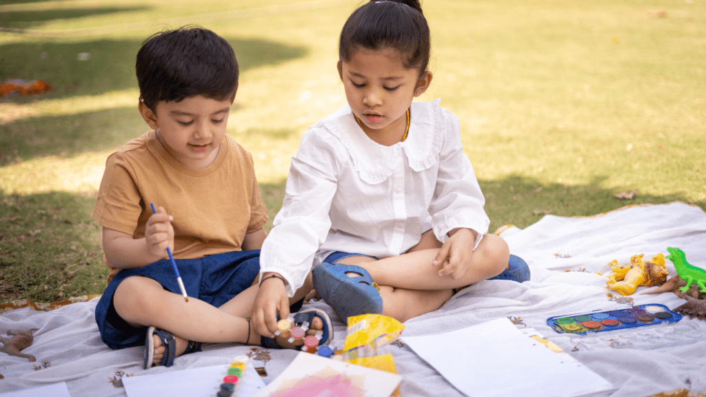 image of a children painting outdoor