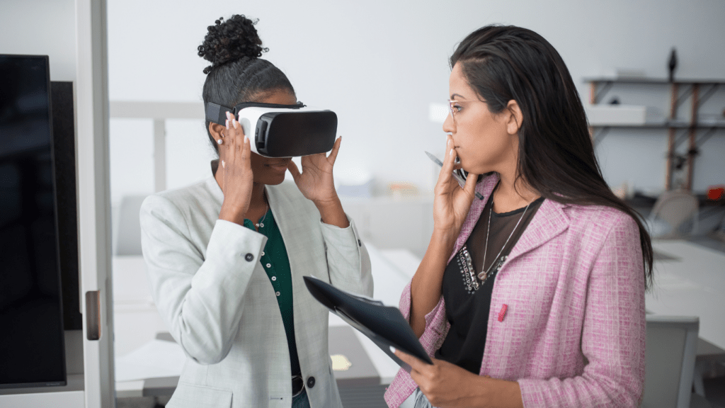 two individuals wearing virtual reality glasses in an office