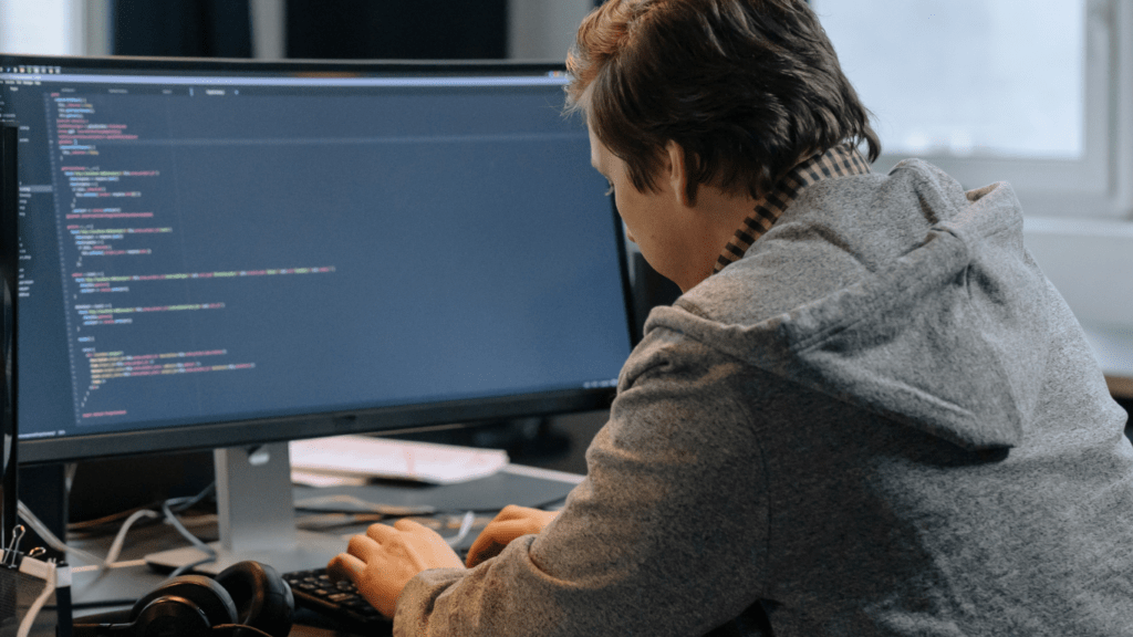 a person is working on a computer screen