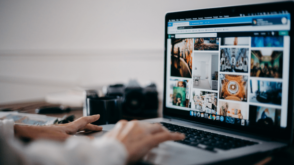 a person sits at a desk with a laptop