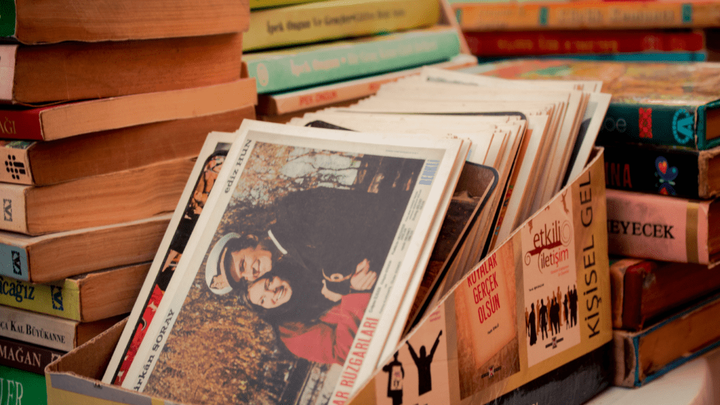 a pile of comic books sitting on top of each other